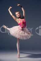 Portrait of the ballerina in ballet pose