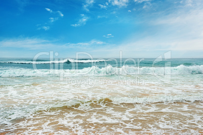 Ocean waves and blue sky