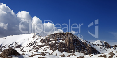 Panoramic view of snowy rocks in nice day