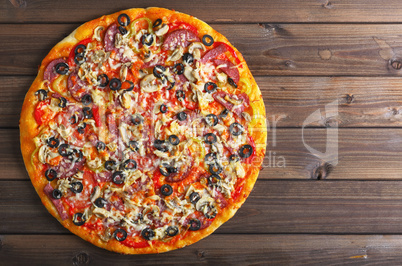 pizza on a wooden table