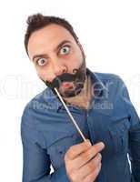 Young man with photo booth mustache