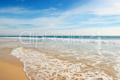 Ocean waves and blue sky