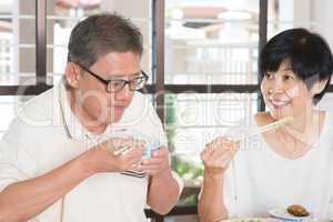 Asian Senior Couple Eating