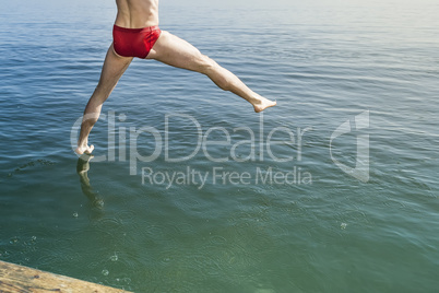 jumping into the water