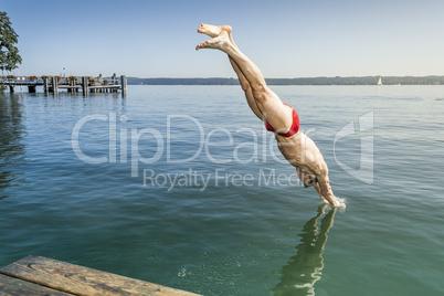 jumping into the water