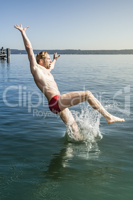 jumping into the water