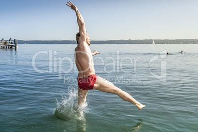 jumping into the water