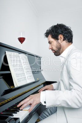 man with piano