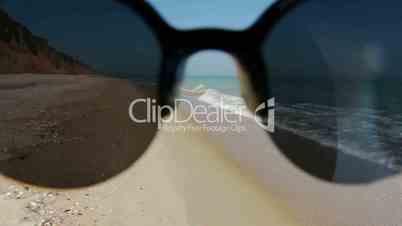 Empty Beach and Sunglasses