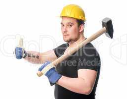 Handwerker mit Vorschlaghammer zeigt Daumenhoch