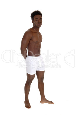 Black man standing in underwear.