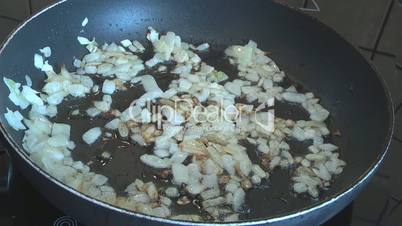 Cooking vegetables in a pan