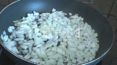 Cooking vegetables in a pan
