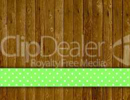 Holzbretter mit Holztextur und Tischdeckenstreifen grün mit Punkten