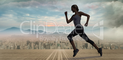 Composite image of pretty fit blonde jogging