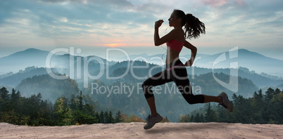 Composite image of full length of healthy woman jogging