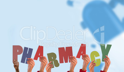 Composite image of hands holding up pharmacy Composite image of hands holding up pharmacy