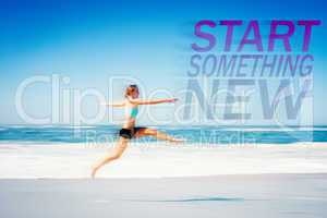 Composite image of fit woman jumping gracefully on the beach
