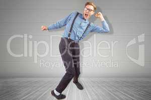 Composite image of geeky hipster dancing to vinyl