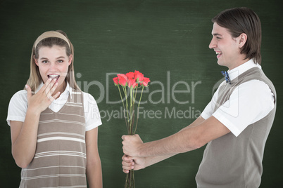 Composite image of geeky hipster offering red roses to his girlf