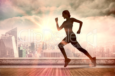 Composite image of pretty fit blonde jogging