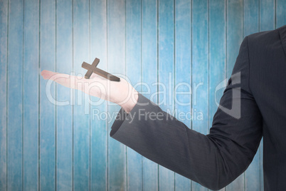 Composite image of businessman with his hand out