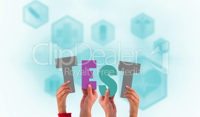Composite image of hands holding up test