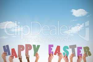 Composite image of hands holding up happy easter