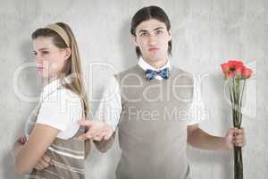 Composite image of geeky hipster couple not talking after argume