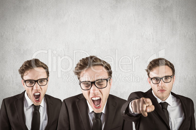 Composite image of nerdy businessman shouting