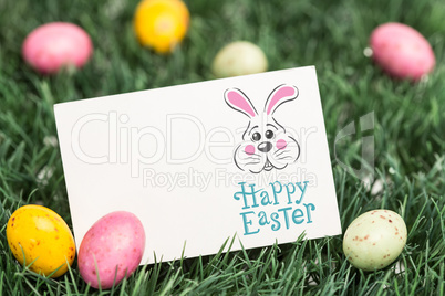 Composite image of easter bunny with greeting