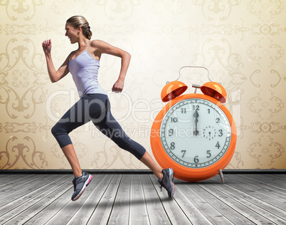 Composite image of pretty fit blonde jogging