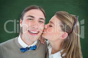 Composite image of pretty geeky hipster giving boyfriend kiss on
