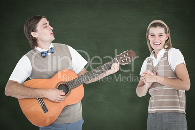 Composite image of geeky hipster serenading his girlfriend with