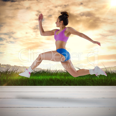 Composite image of fit brunette running and jumping