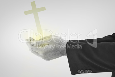 Composite image of businessman holding something with his hands