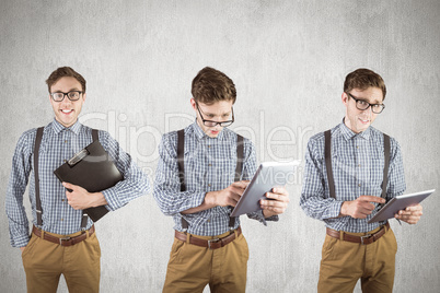 Composite image of nerd with tablet pc