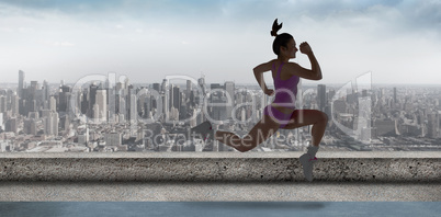 Composite image of fit brunette running and jumping