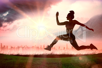 Composite image of fit brunette running and jumping