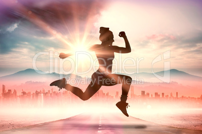 Composite image of fit brunette running and jumping