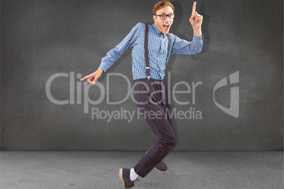 Composite image of geeky hipster dancing to vinyl