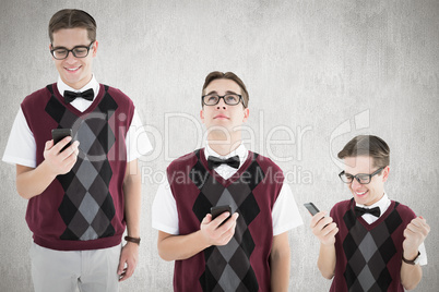 Composite image of nerd with smartphone