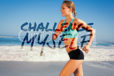 Composite image of fit woman jogging on the beach