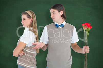 Composite image of geeky hipster couple not talking after argume