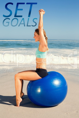 Composite image of fit woman sitting on exercise ball at the bea