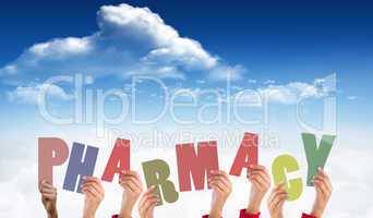 Composite image of hands holding up pharmacy