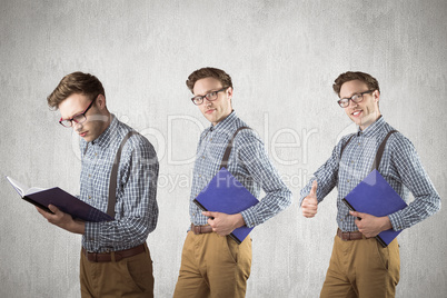 Composite image of nerd with notebook