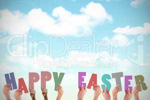 Composite image of hands holding up happy easter