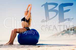 Composite image of fit blonde sitting on exercise ball at the be