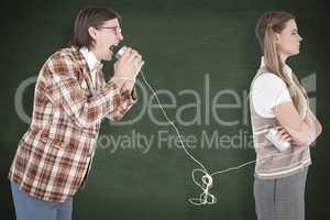 Composite image of geeky hipsters using string phone